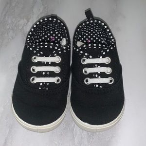 Garanimals baby black slip on shoes with white dots inside. Size 5.